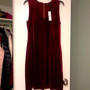 Never worn, tags attached, burgundy velvet dress